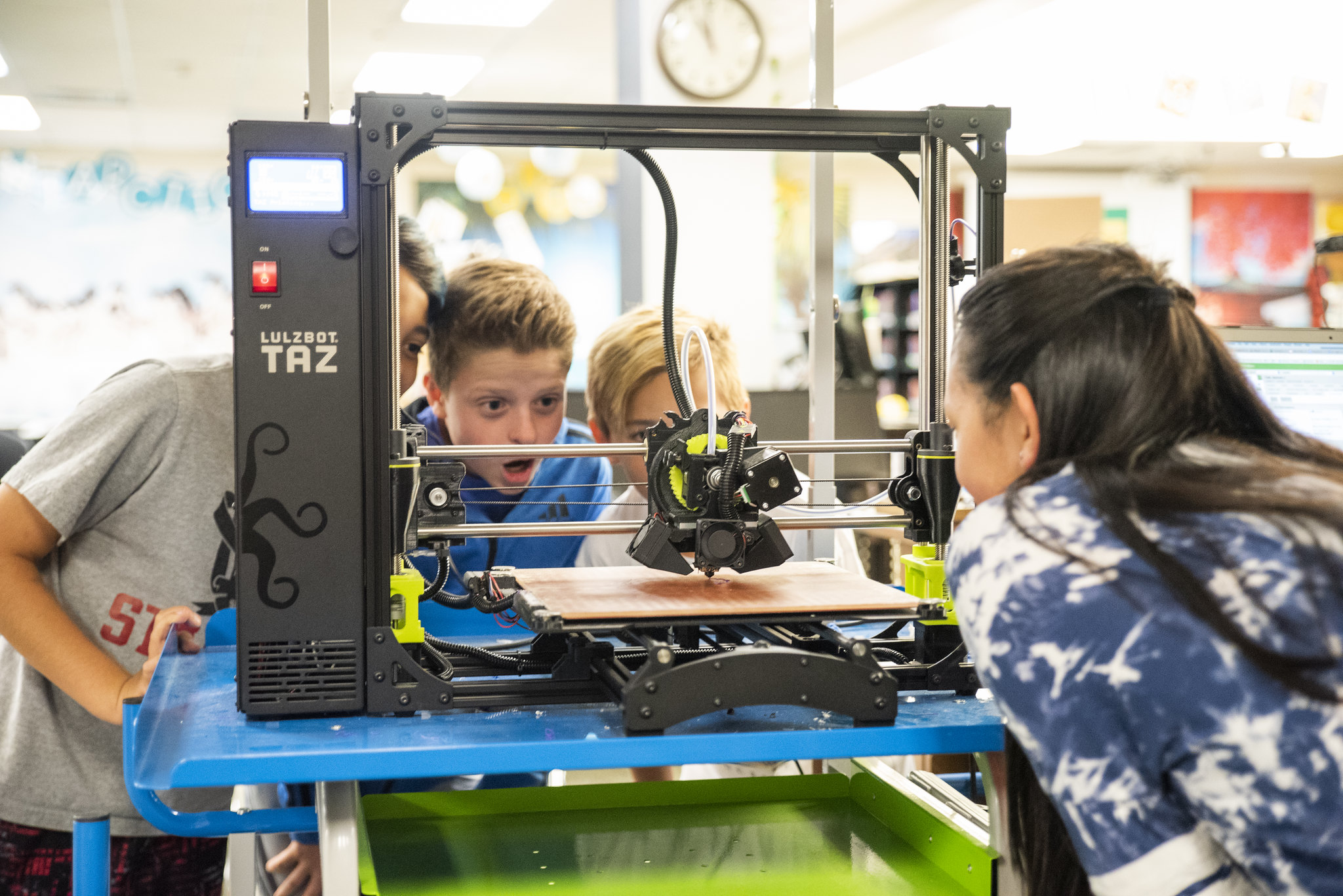 students with a 3d printer